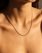 Liv Beaded Necklace gold ball chain on model