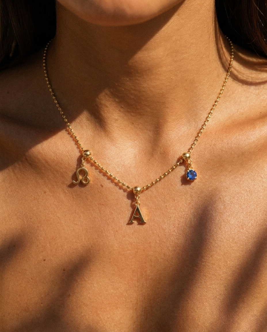 Liv Beaded Necklace styled with gold charm cluster on model