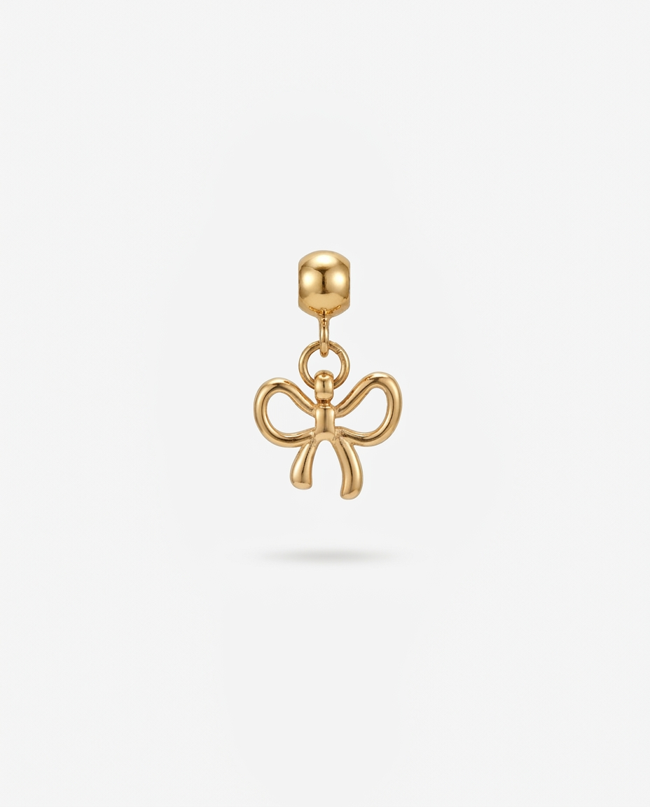 Bow gold charm pendant hero
