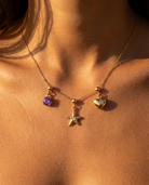 Starfish charm styled with February amethyst and heart on chain