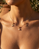 June birthstone charm necklace worn, styled