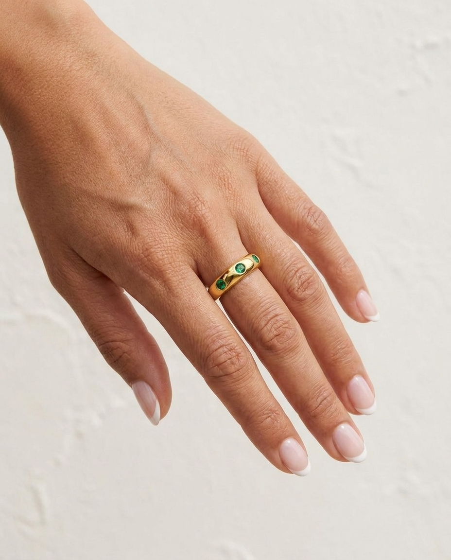 Vita Ring on hand against cream wall