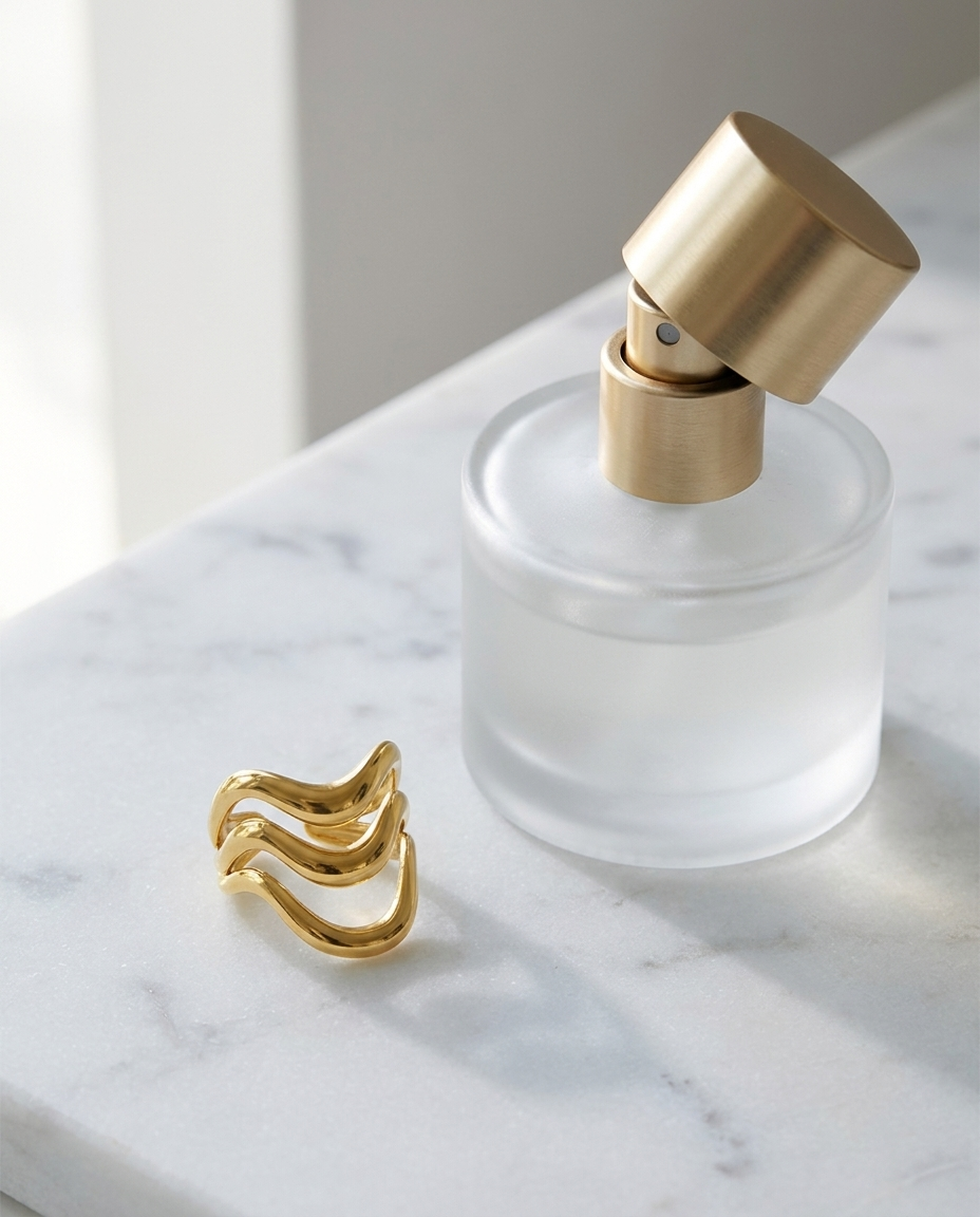 Gold Wave Statement Ring marble flatlay