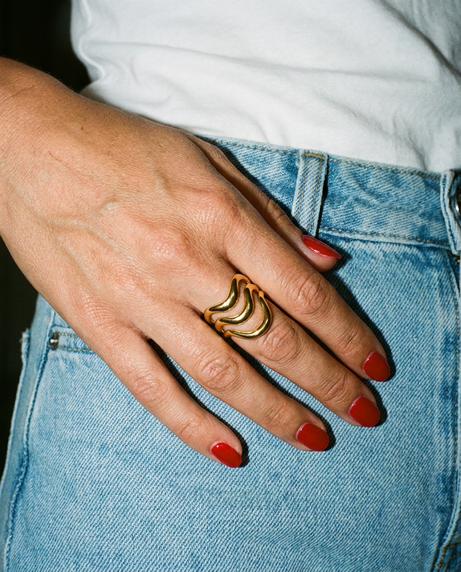 Gold Wave Statement Ring candid flash snapshot