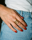 Gold Wave Statement Ring candid flash snapshot