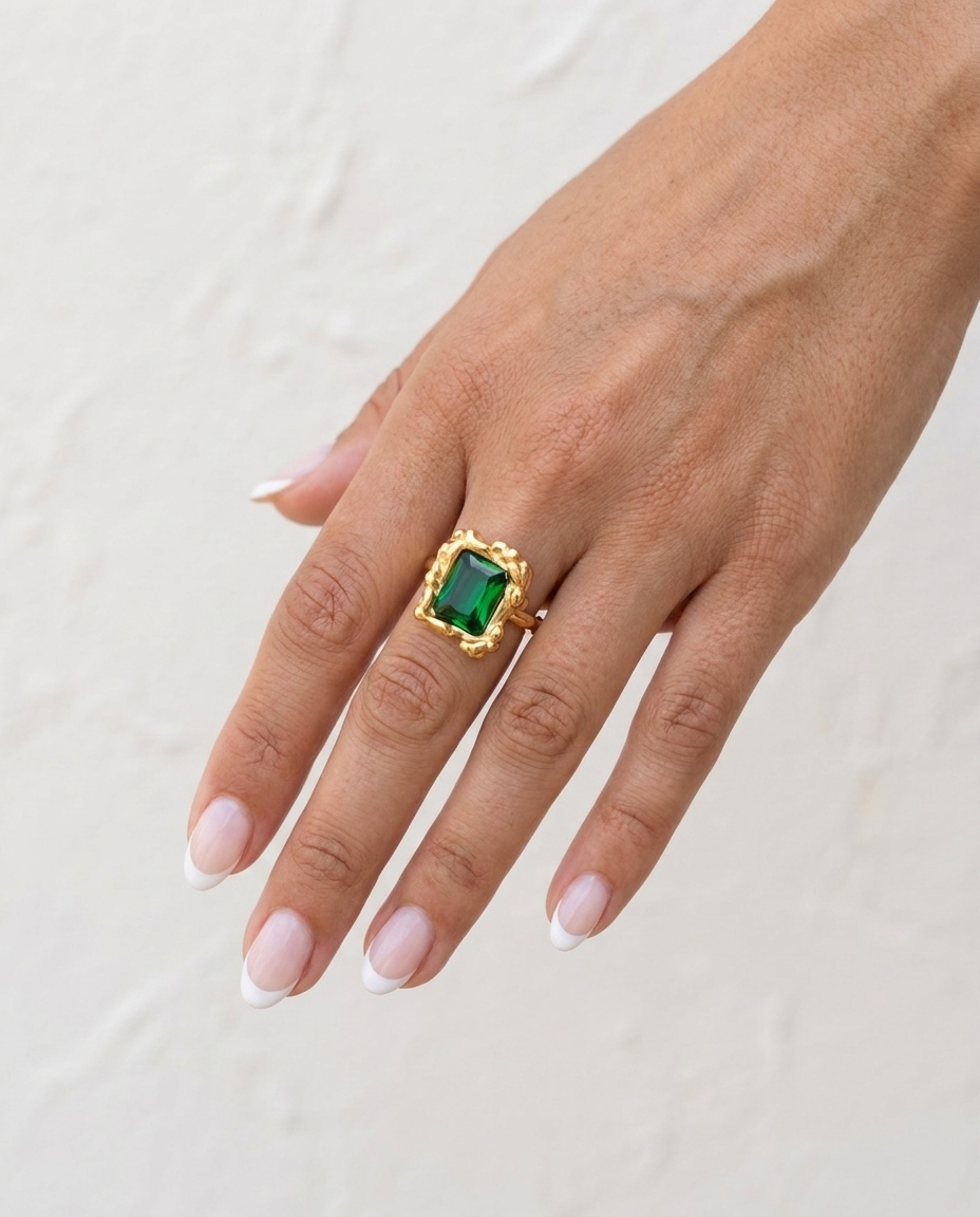 Colette Emerald Ring cream wall hand