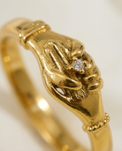 Gold Handshake Ring macro detail