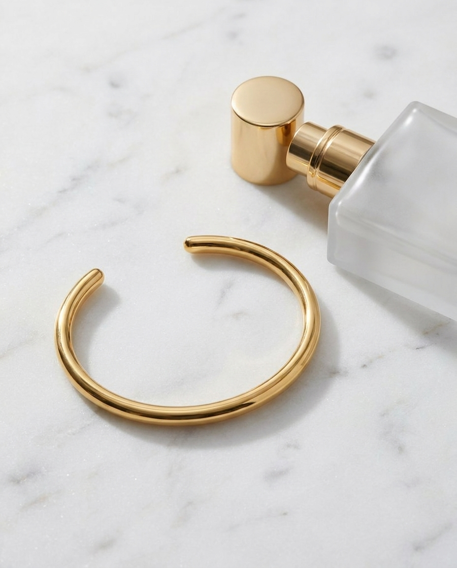 Solene Gold Bangle marble flatlay