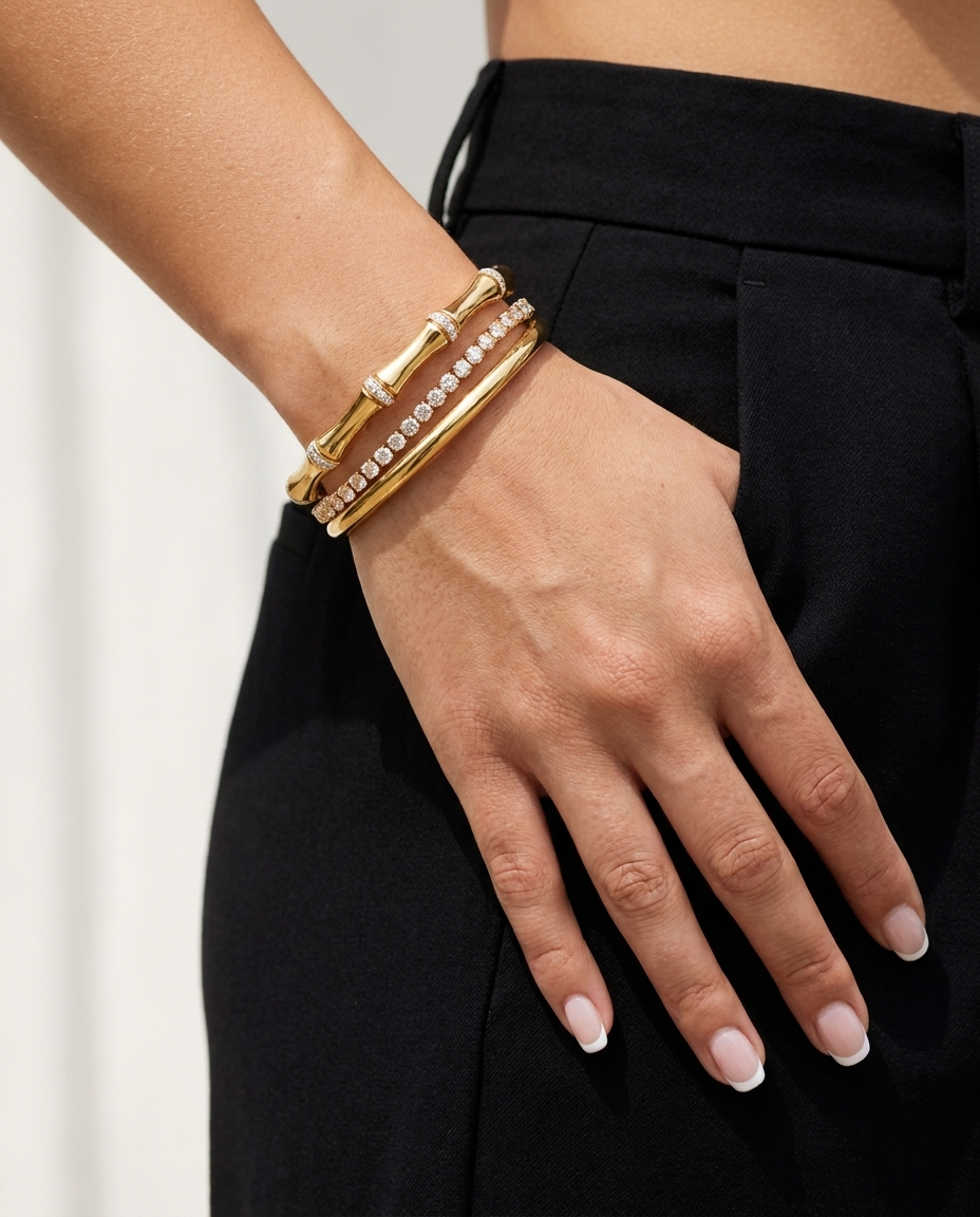 Solene Gold Bangle styled stack on wrist