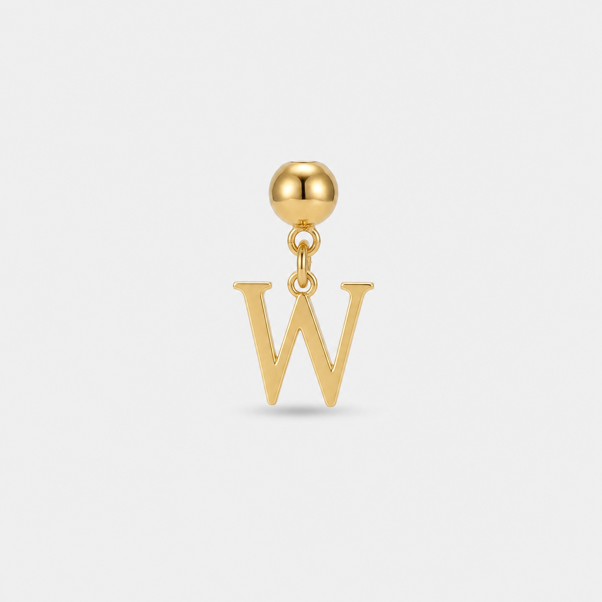 Gold initial letter W charm pendant