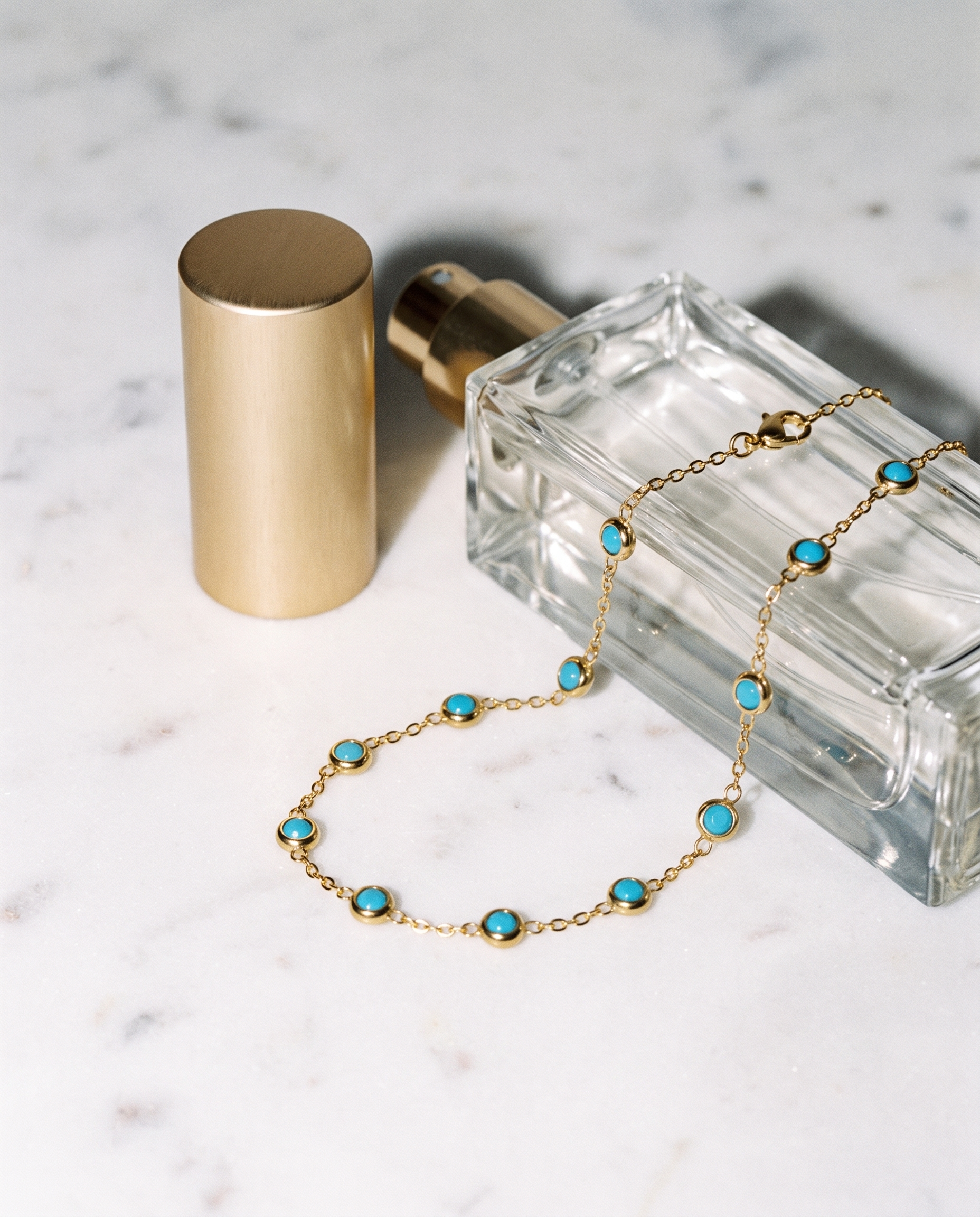 Capri hand chain marble flatlay