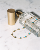Capri hand chain marble flatlay