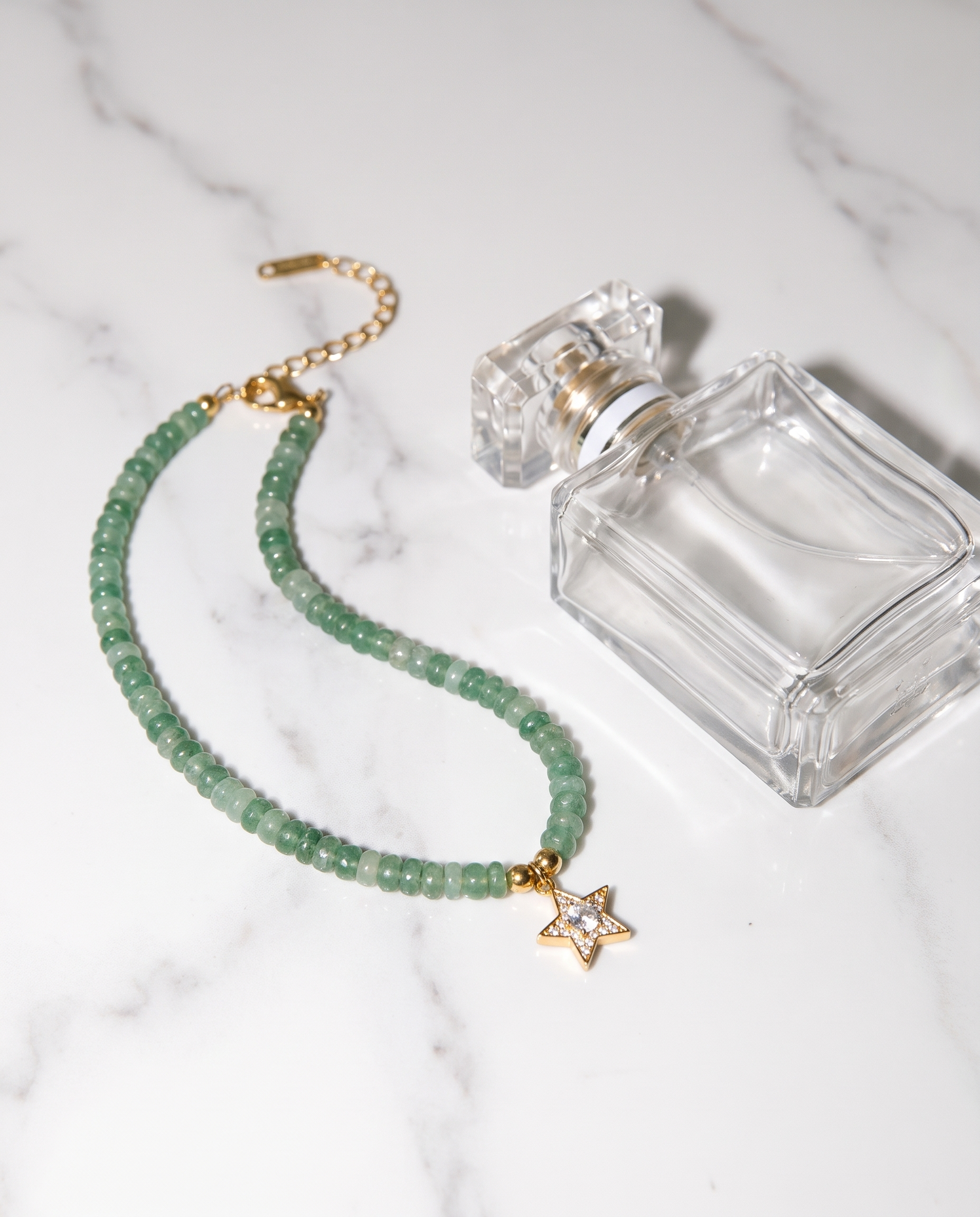 Ondine necklace marble flatlay