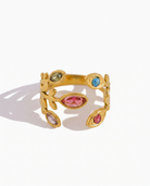 Fleur colourful crystal ring on off white background