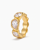 Lison chunky zircon band ring in 18k gold on off white background