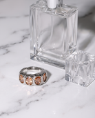 Clemence silver champagne zircon ring flatlay on marble