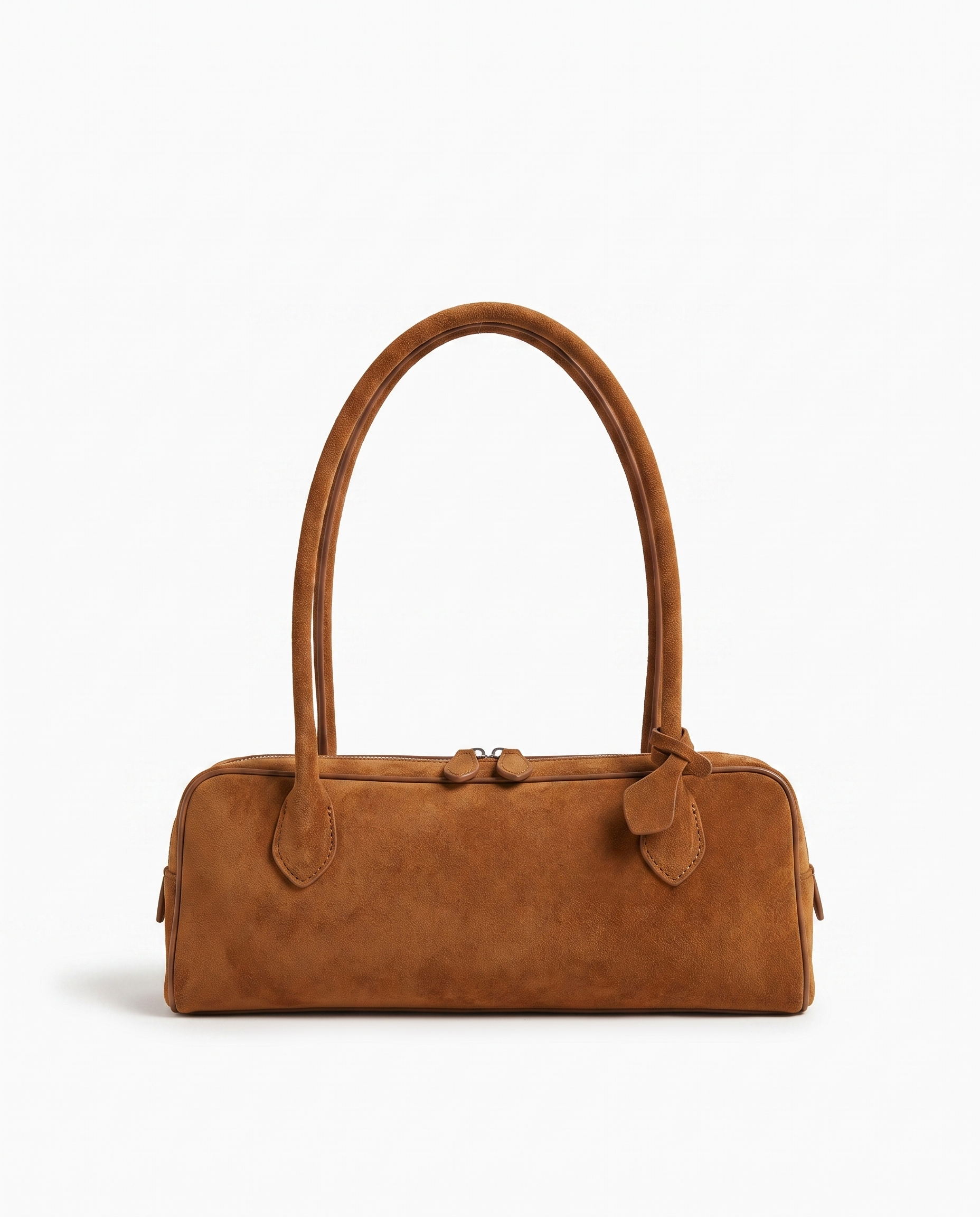 Salome suede baguette shoulder bag in cognac on off white background