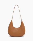 Josephine moon shaped shoulder bag in brown on off white background