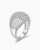 Maille openwork dome statement ring in silver on off white background