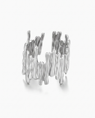 Bouleau bark textured open ring in silver on off white background