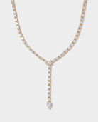 Celeste Y-shaped lariat zircon tennis necklace in gold on off white background