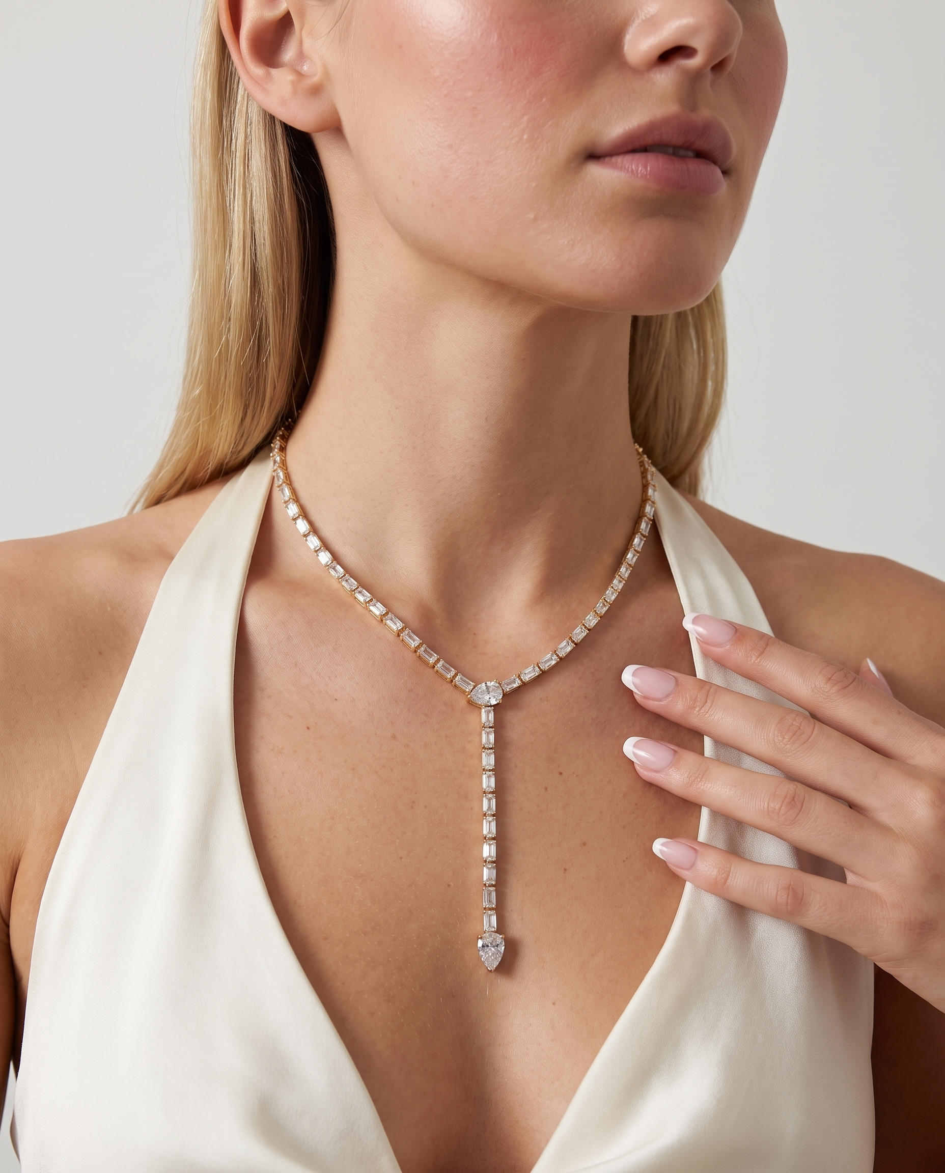 Celeste lariat necklace worn on model at the collarbone