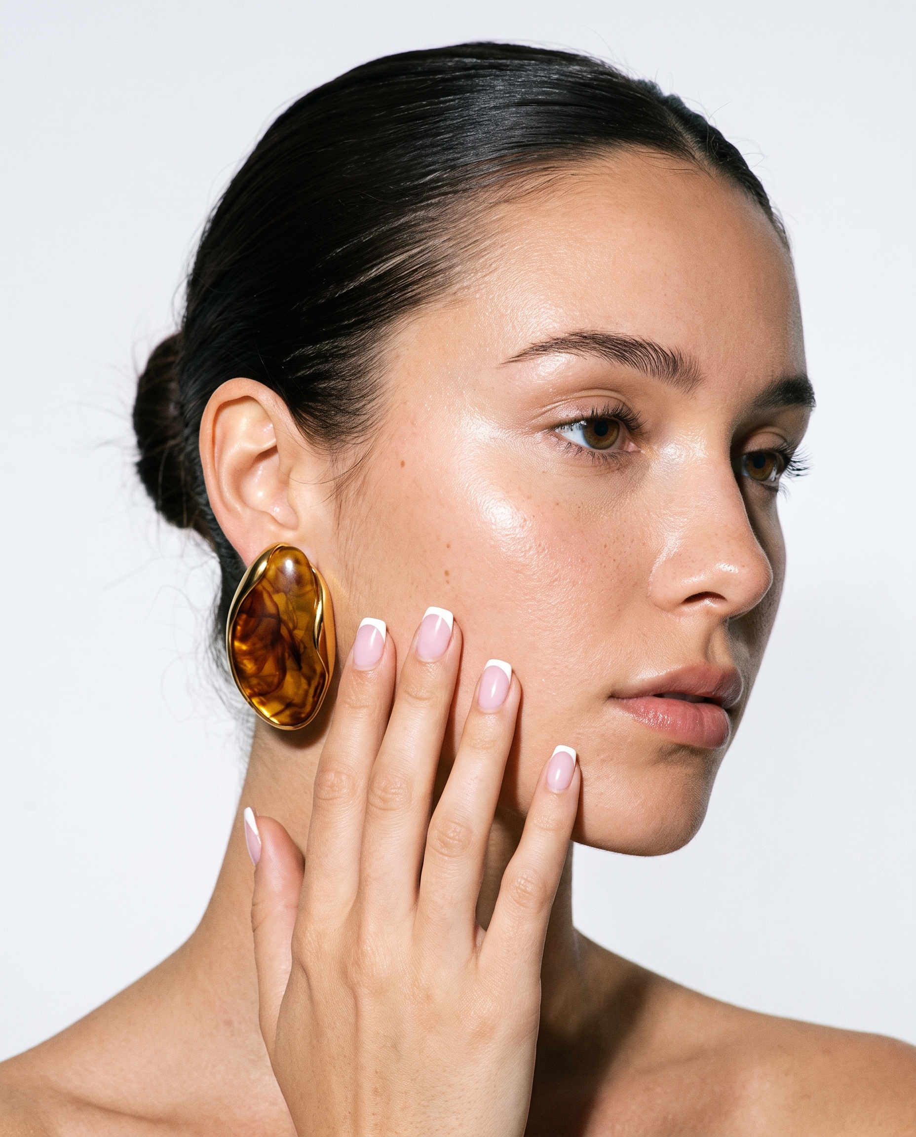 Galet amber pebble studs editorial flash