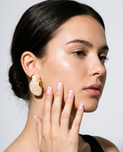Galet cream pebble studs editorial flash