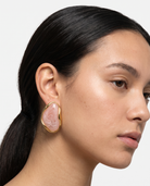 Galet blush pebble studs worn on model