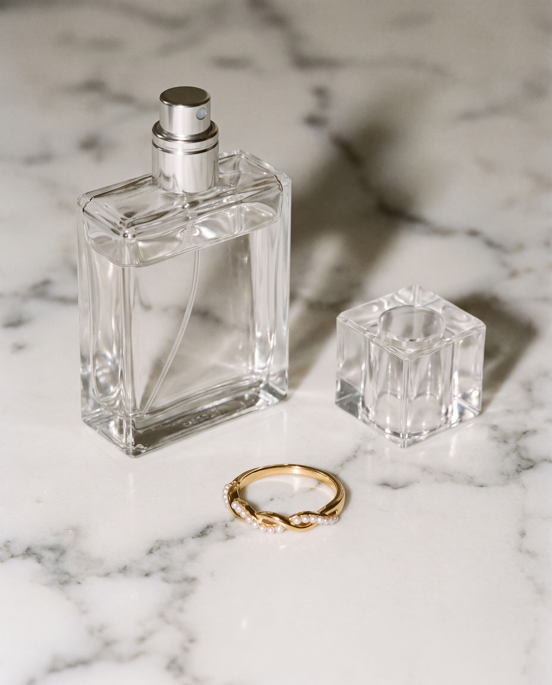 Torsade twisted pearl ring flatlay on marble