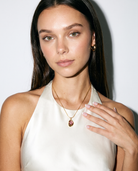 Caillou rose stone necklace editorial studio flash