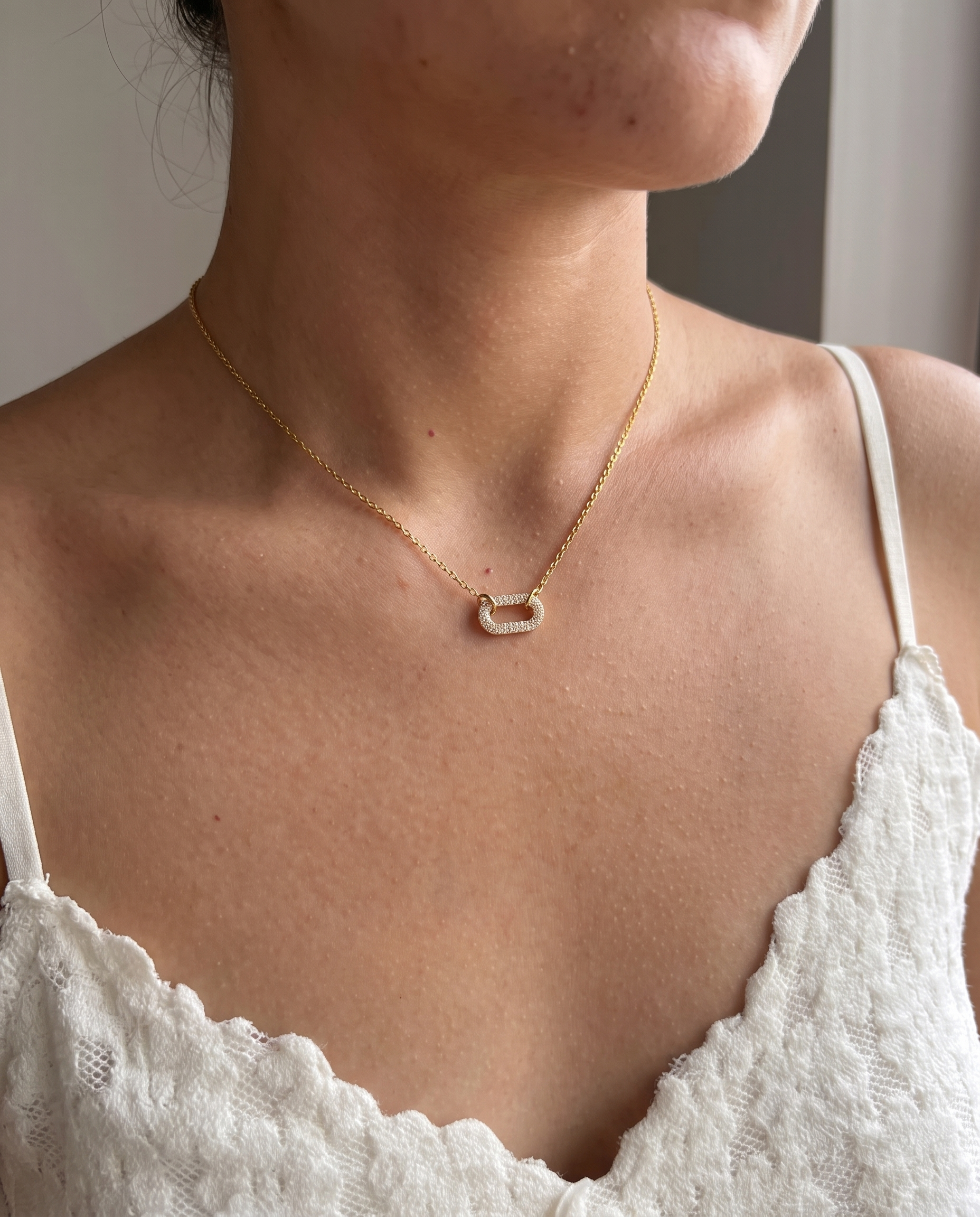 Anneau double ring zircon necklace worn on model