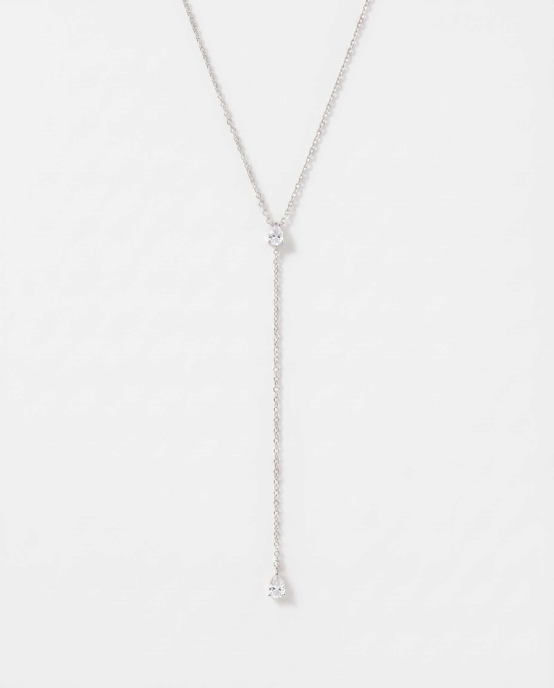 Margot Y-shaped lariat CZ necklace on soft studio background