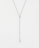 Margot Y-shaped lariat CZ necklace on soft studio background