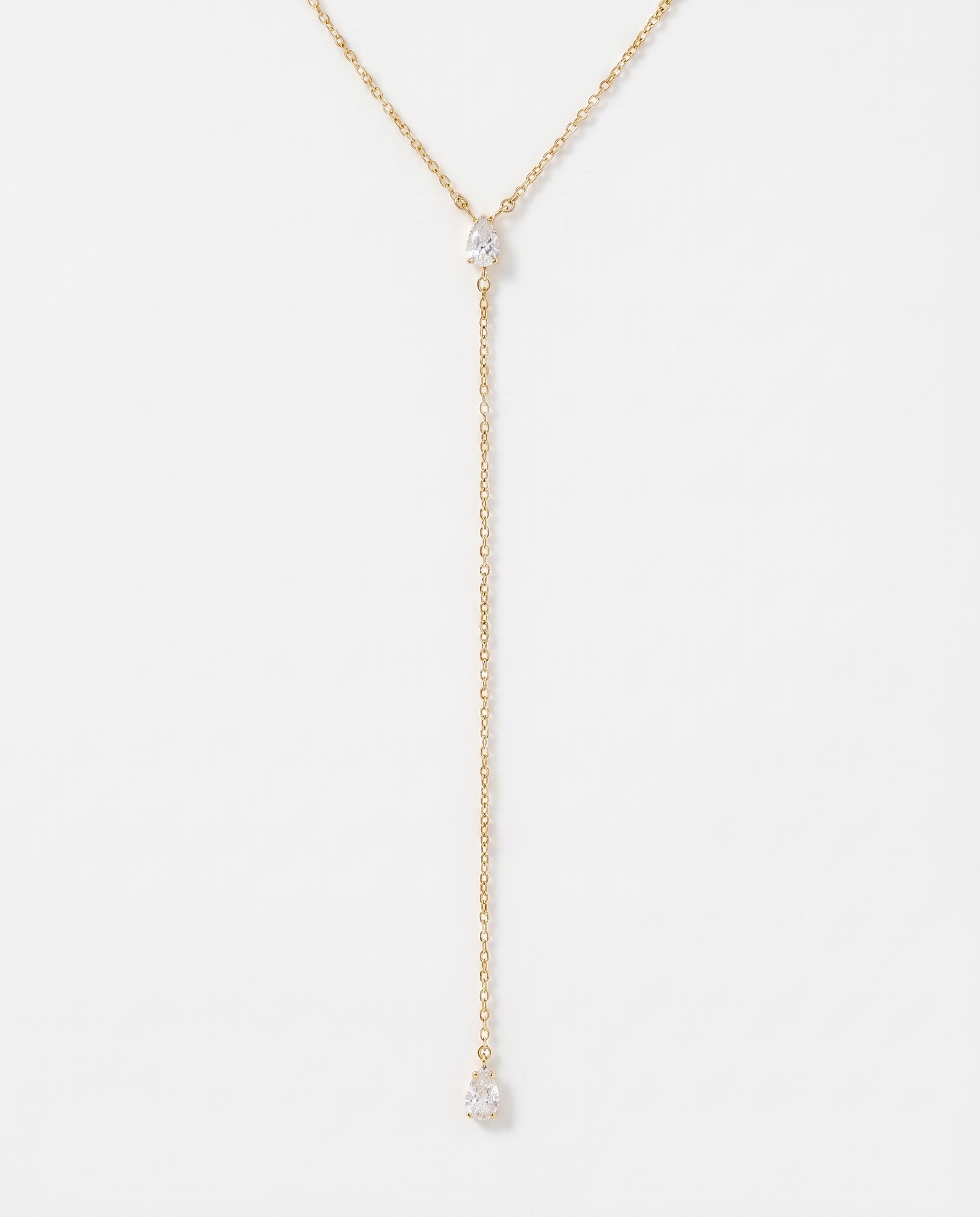 Manon Y-shaped lariat CZ necklace on soft studio background
