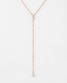 Manon Y-shaped lariat CZ necklace on soft studio background