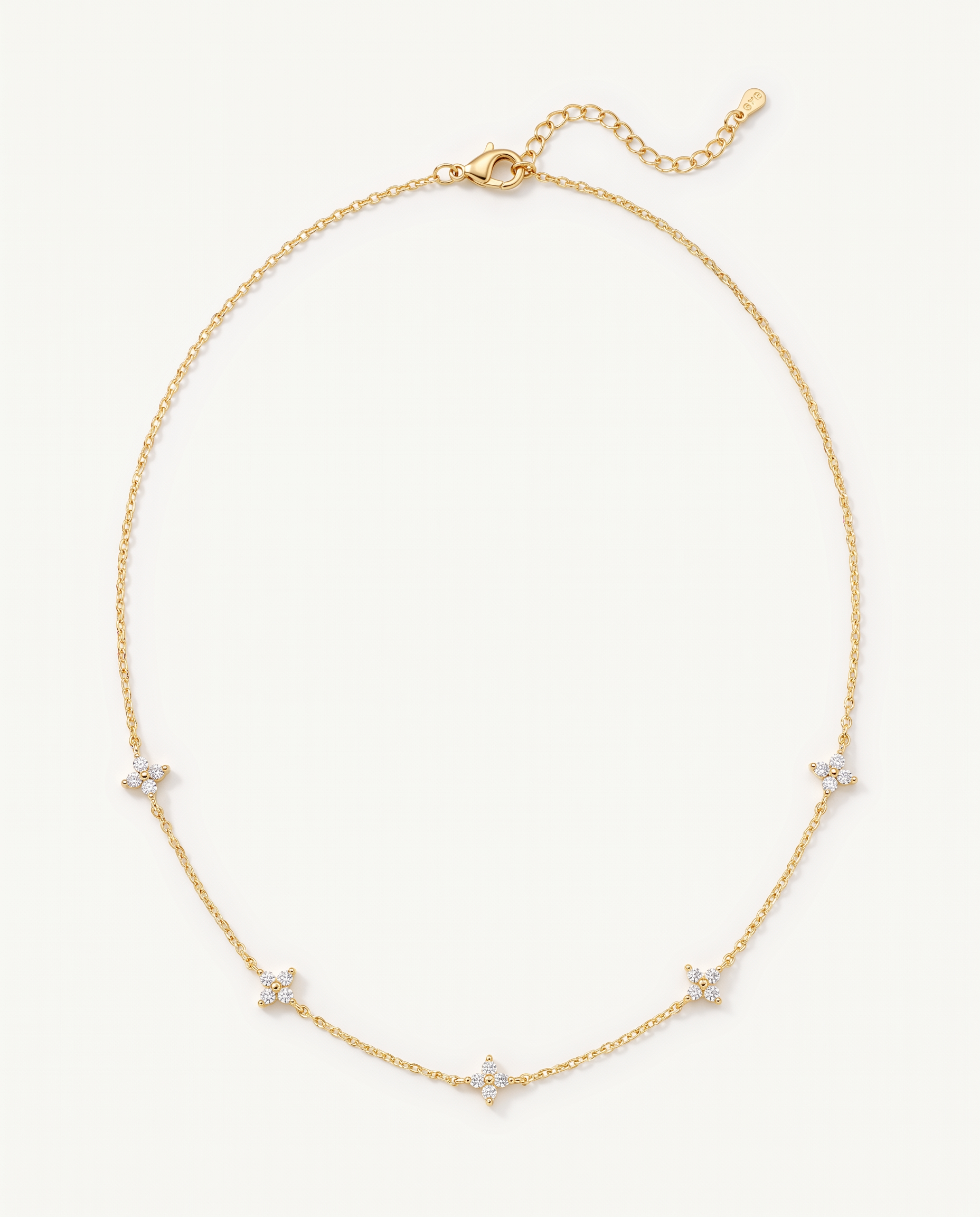 Clover Glow Necklace - gold chain with five cubic zirconia clover stations