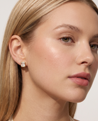 Amelie heart stud earring worn on blonde model