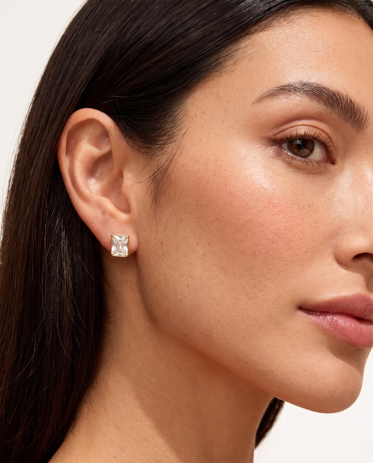 Amelie heart stud earring worn on olive skinned model