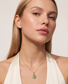 December turquoise necklace worn on model