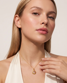 October pink necklace worn on model