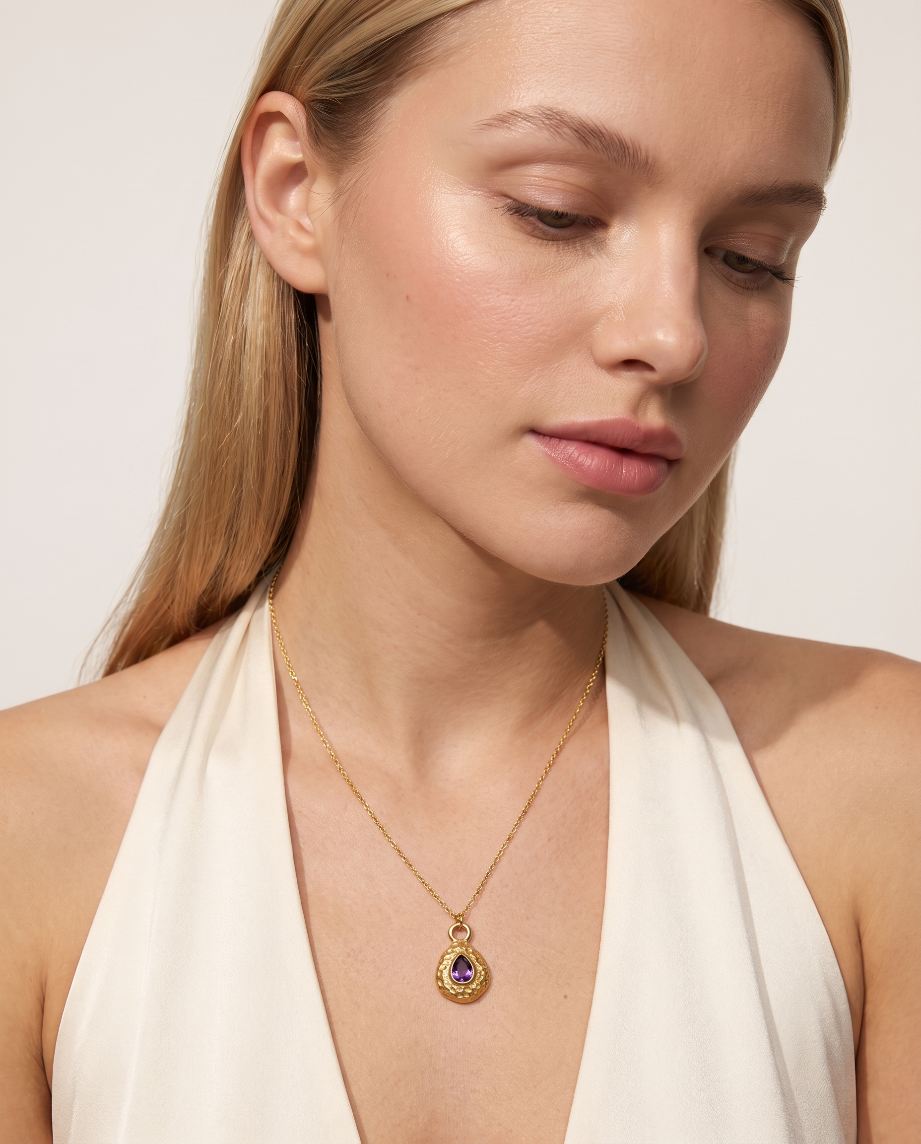 February amethyst necklace worn on model