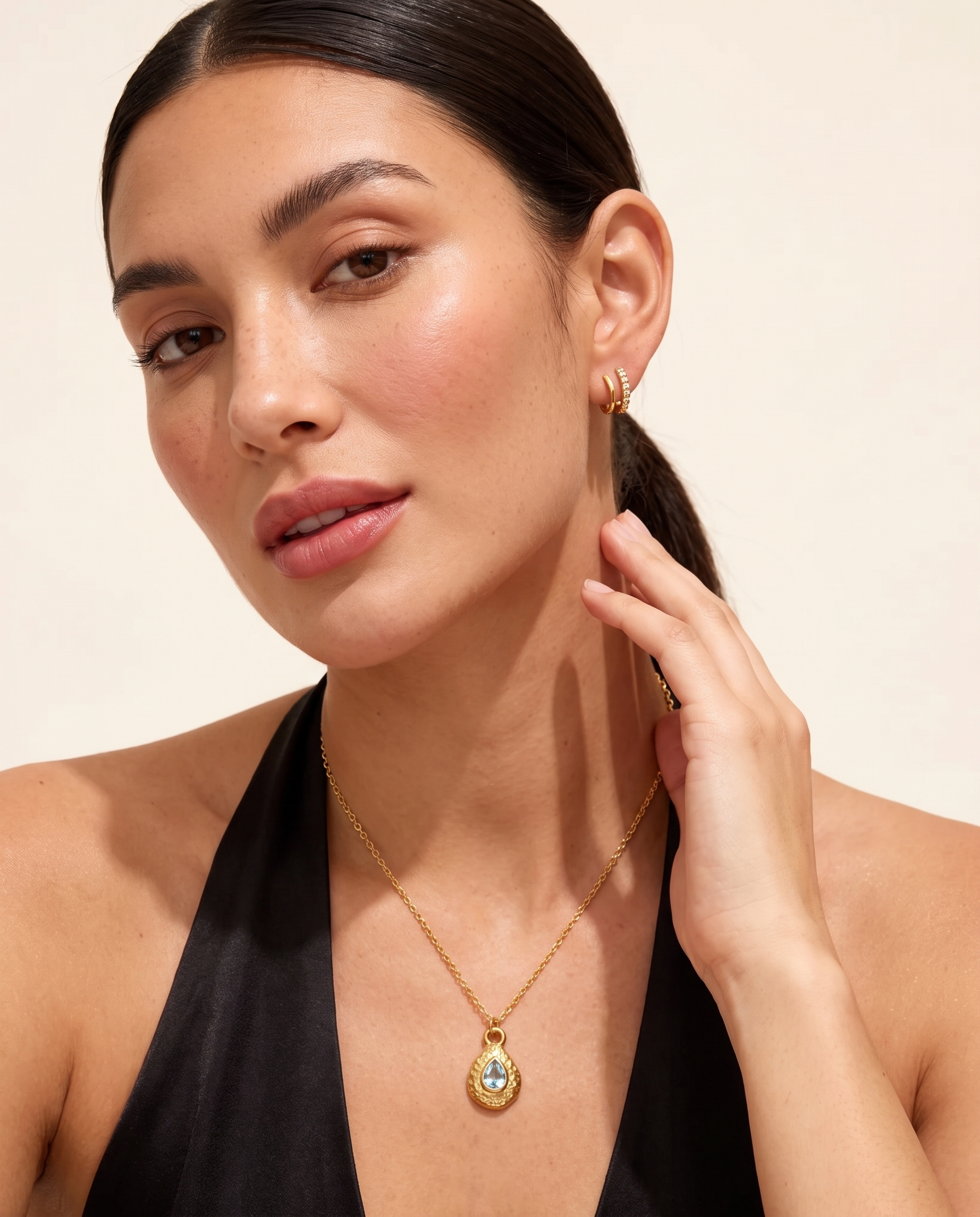 March aquamarine necklace worn on model second