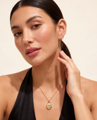 March aquamarine necklace worn on model second