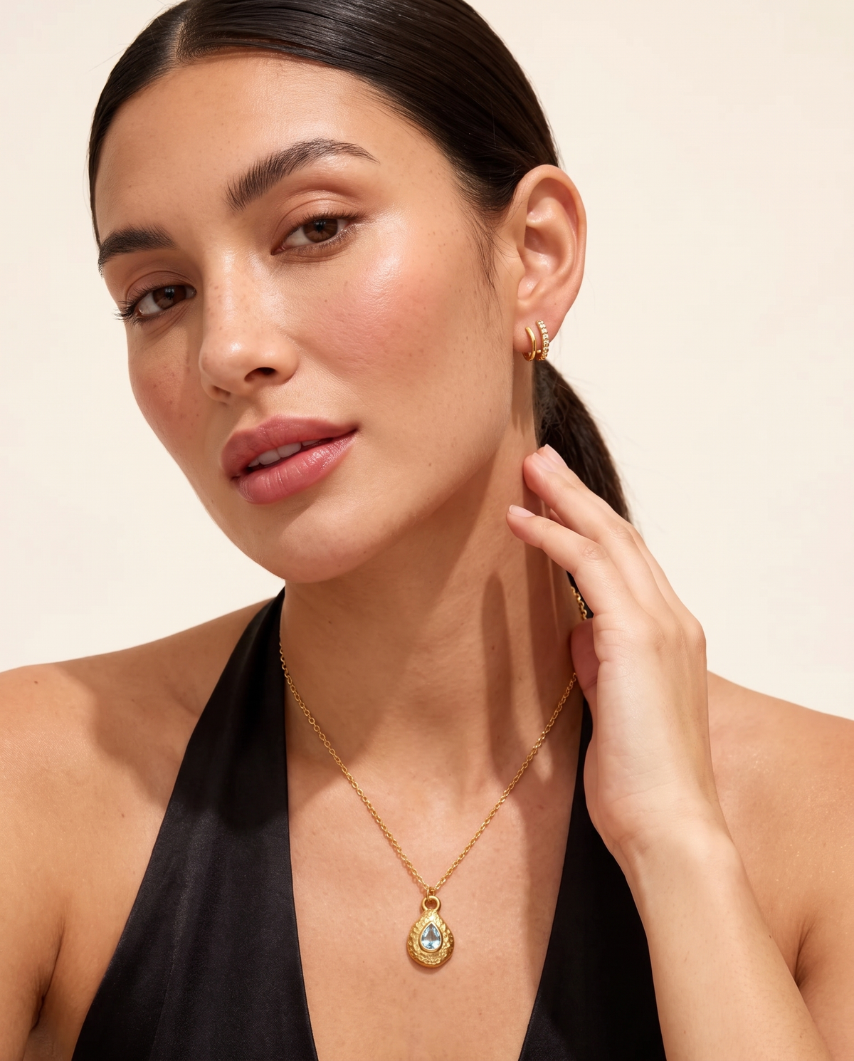 March aquamarine necklace worn on model second