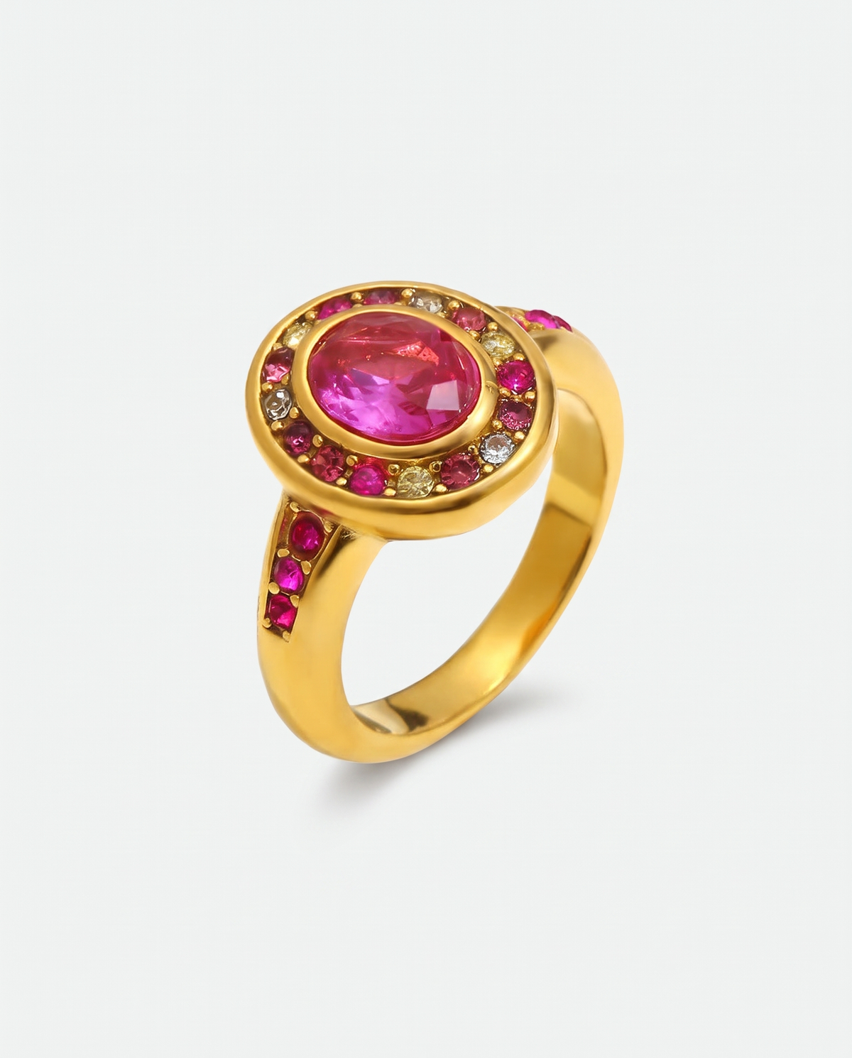 Colette gold colour zircon ring on off white background