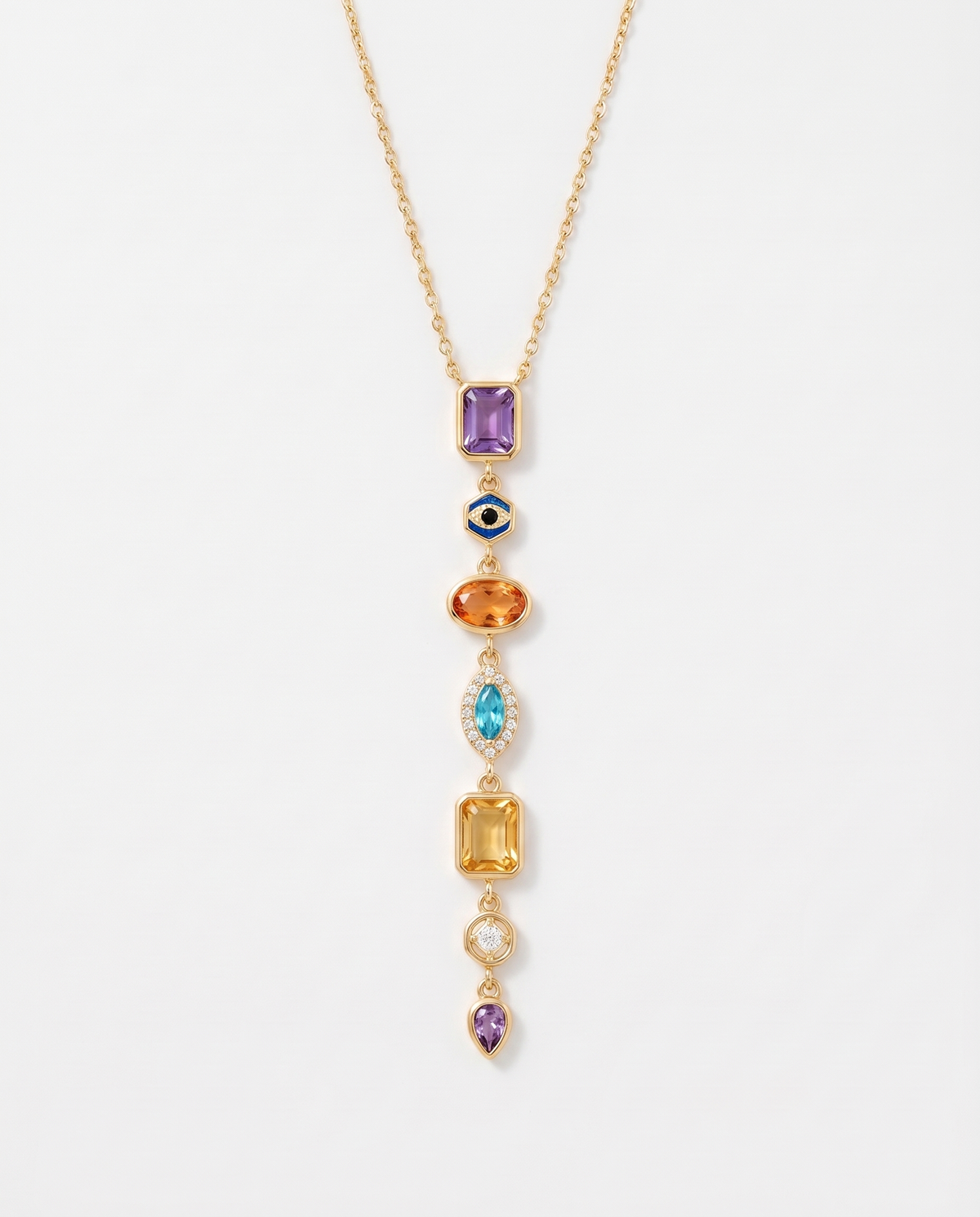 Celeste colourful gemstone drop gold necklace on soft studio background