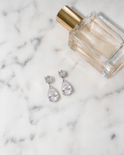 Lisette Drop Earrings, silver, flatlay